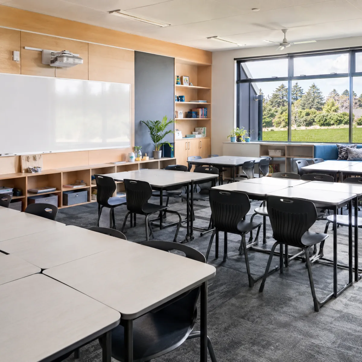 A clean secondary-school classroom with desks